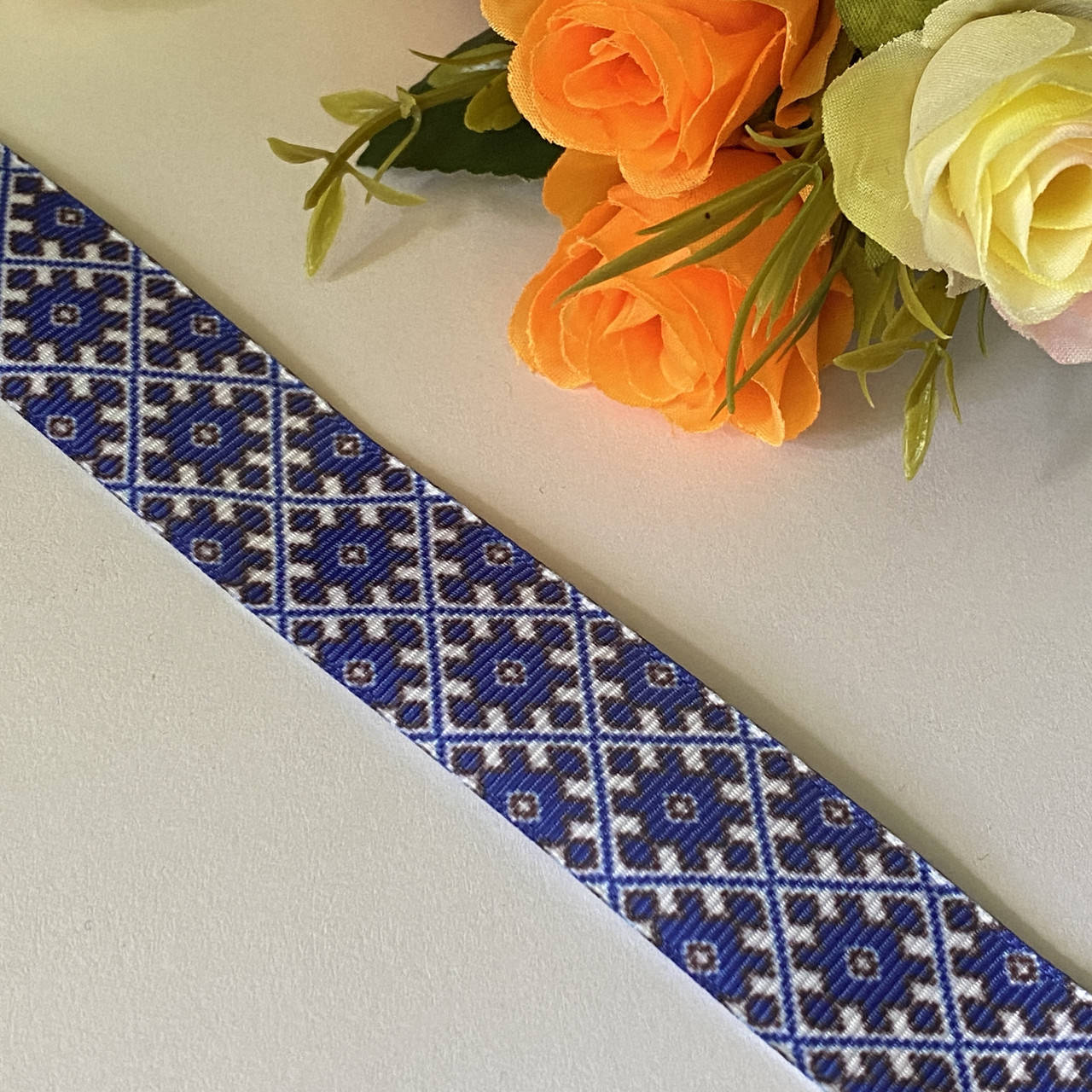 

Репсовая лента 2,5 см Синий орнамент на белом 2, Бежевый