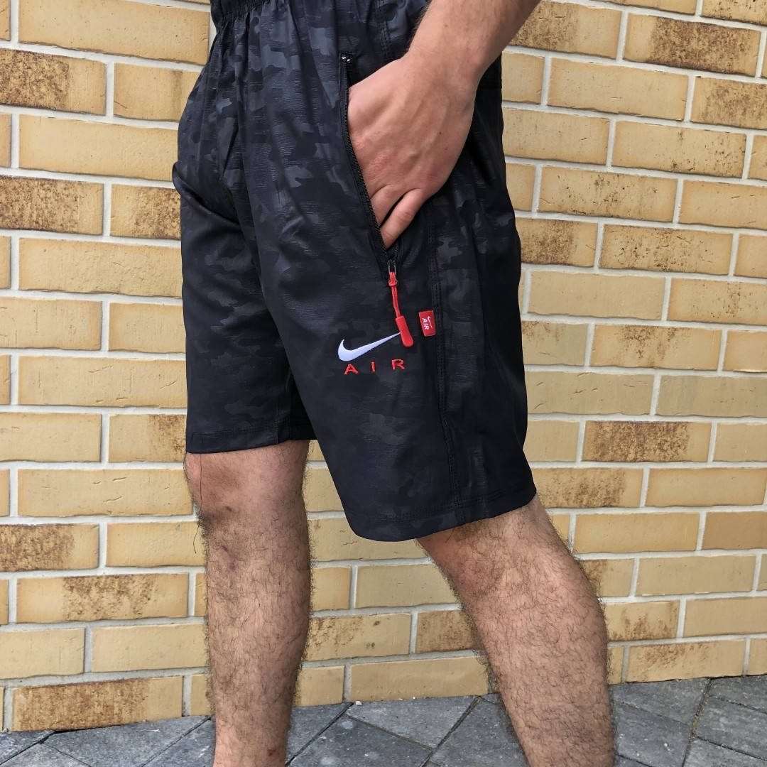 

Спортивные мужские шорты Nike, цвета синий камуфляж