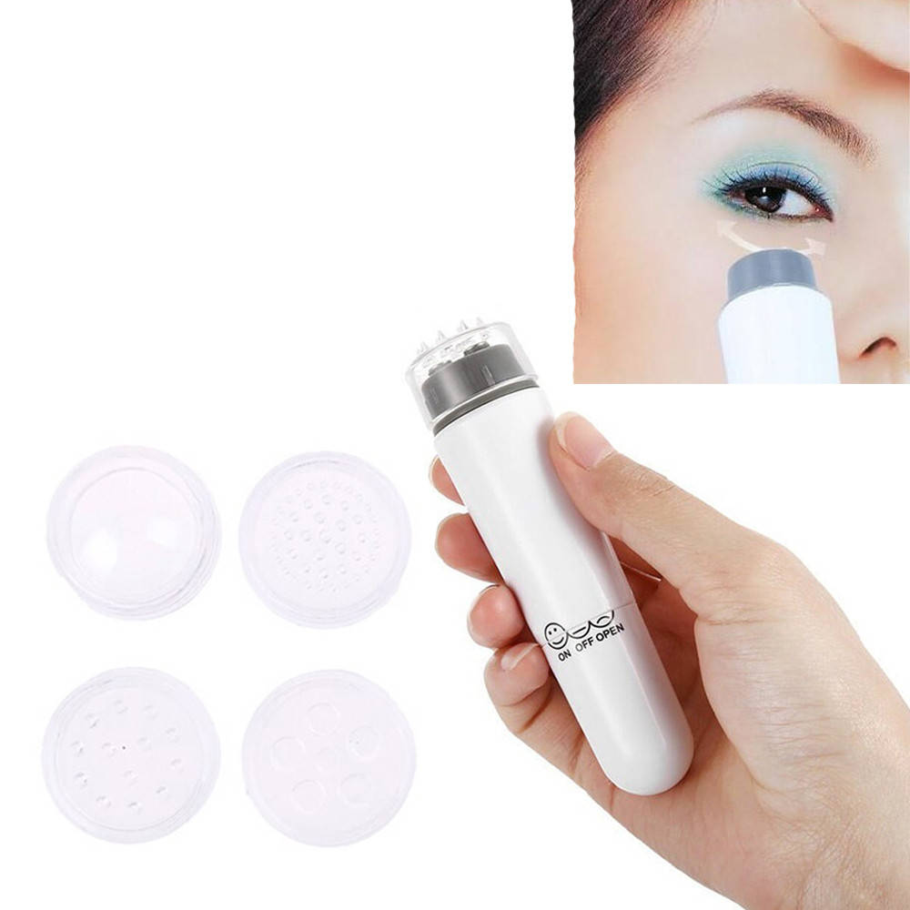 

Мини массажёр для лица с 4 насадками Mini Massager / Электрический компактный роликовый масажер