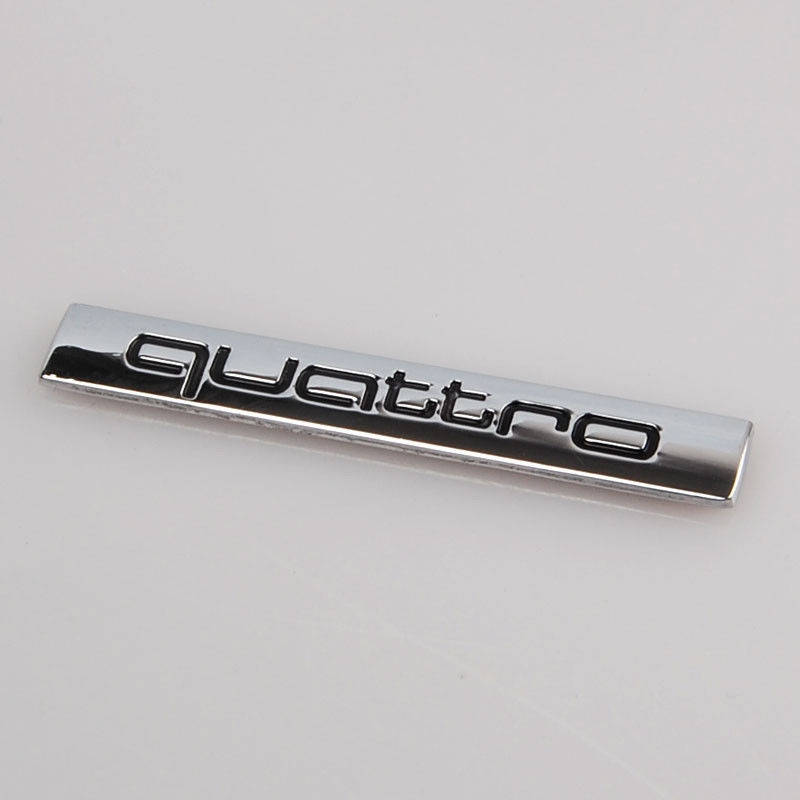 

Эмблема на кузов Audi Quattro