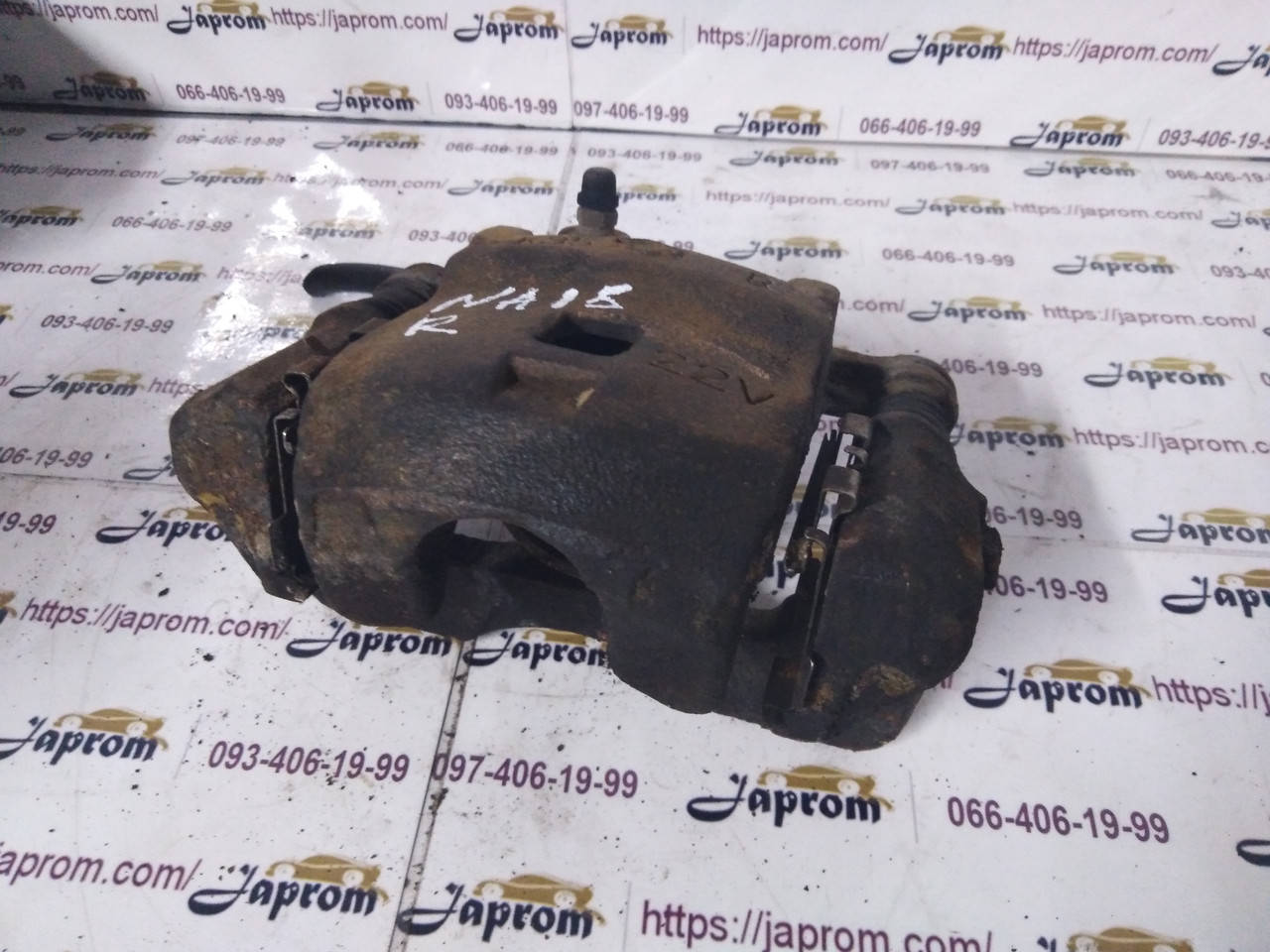 

Суппорт тормозной передний правый Nissan Almera N15 без ABS