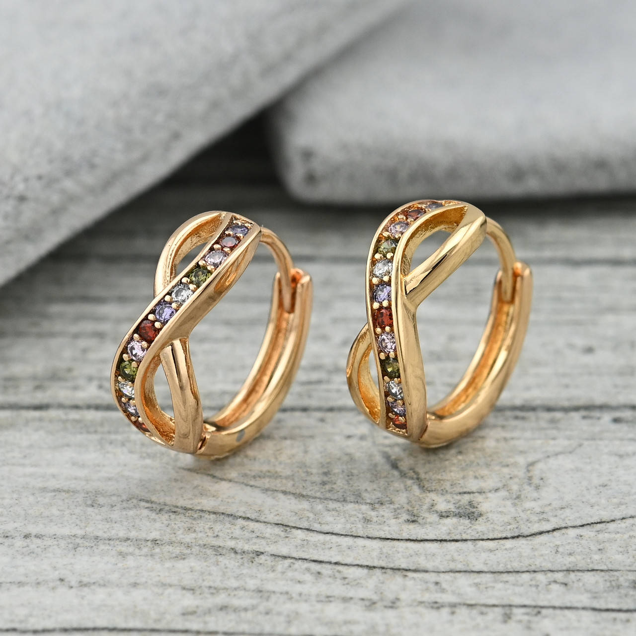 

Серьги 36388 размер 13х5 мм разноцветные фианиты вес 2 г позолота 18К