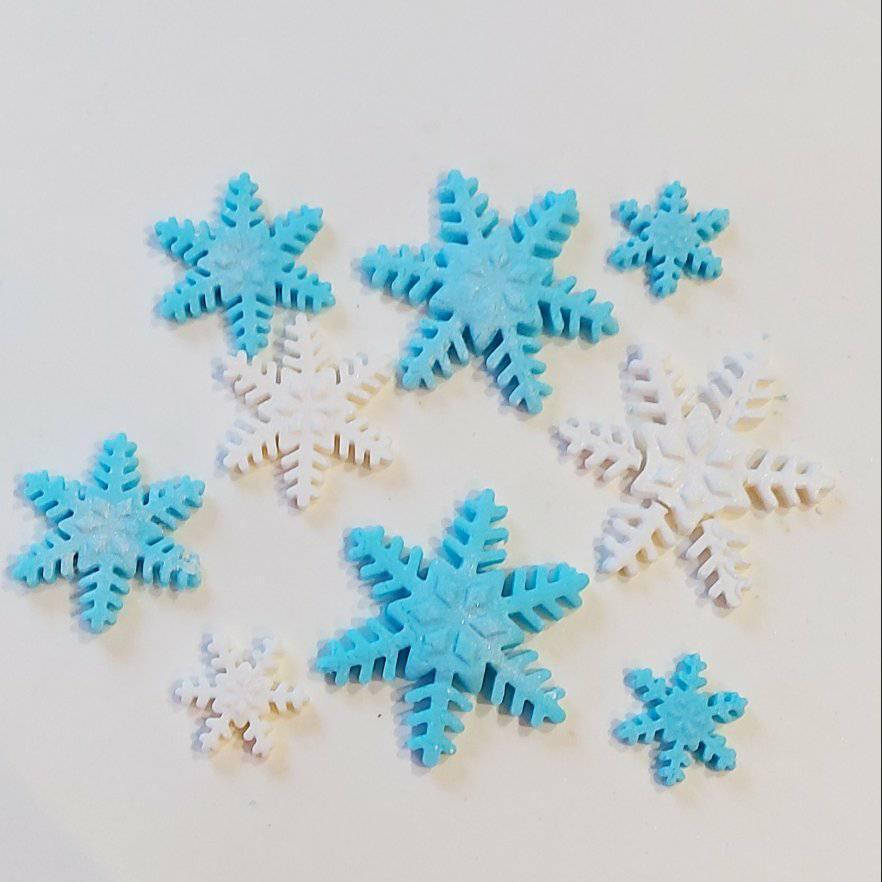 

Сахарное украшение на торт снежинки.