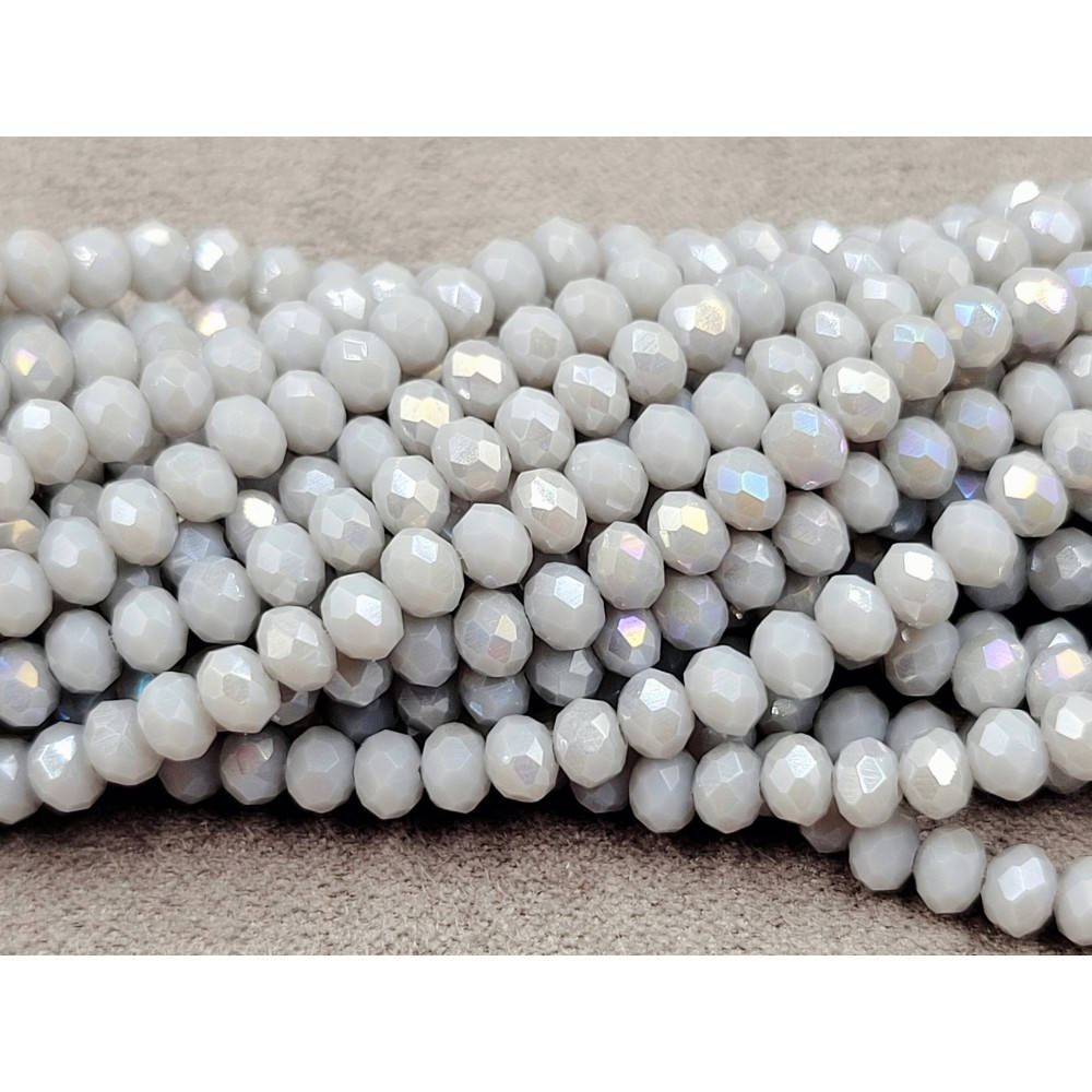 

Хрустальные бусины(рондель). Размер 4 мм. В упаковке прим.140 шт. цвет - серый матовый с переливом