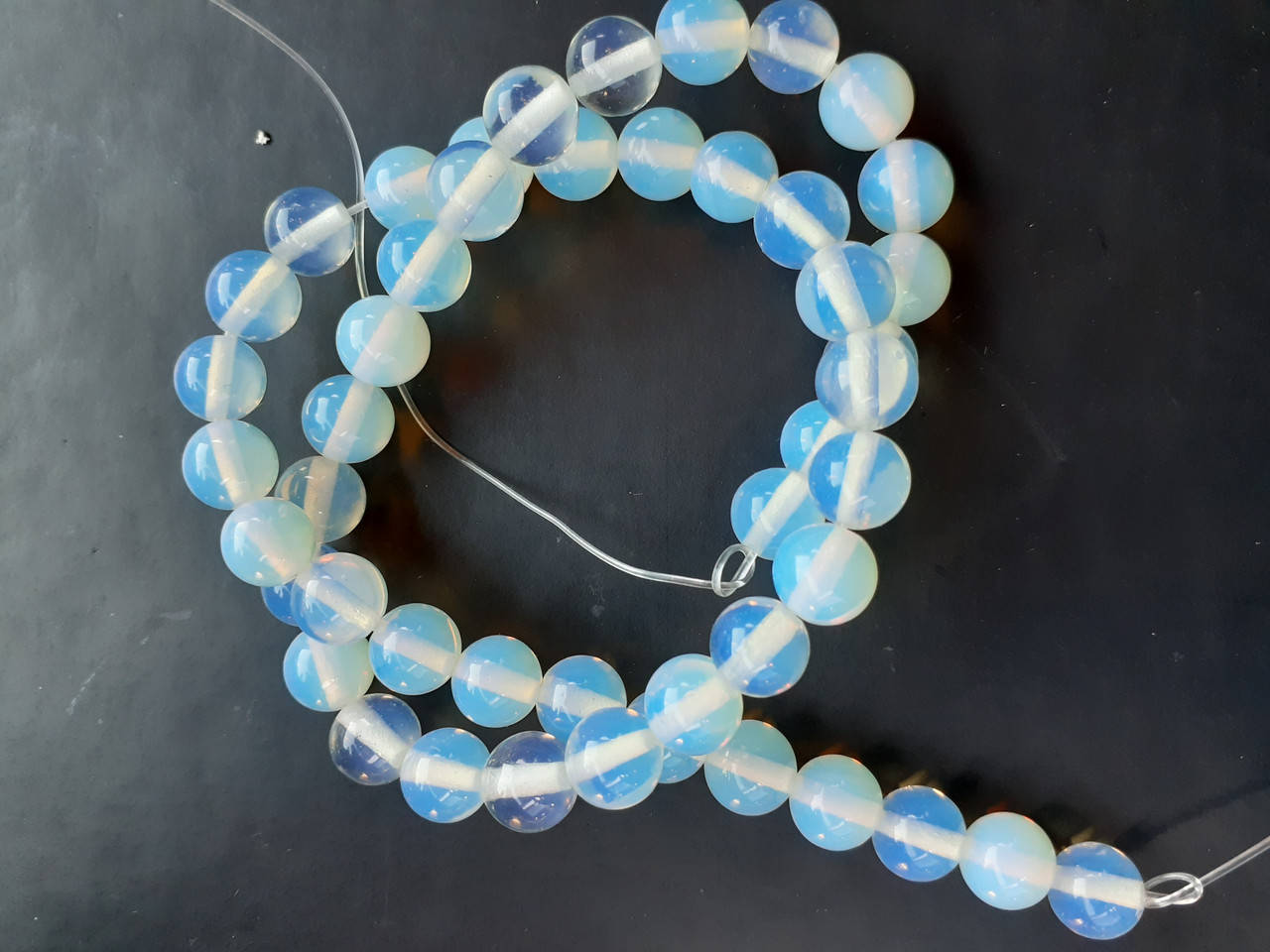 

Бусины на нитке Лунный камень гладкий шарик d-10мм L-37см