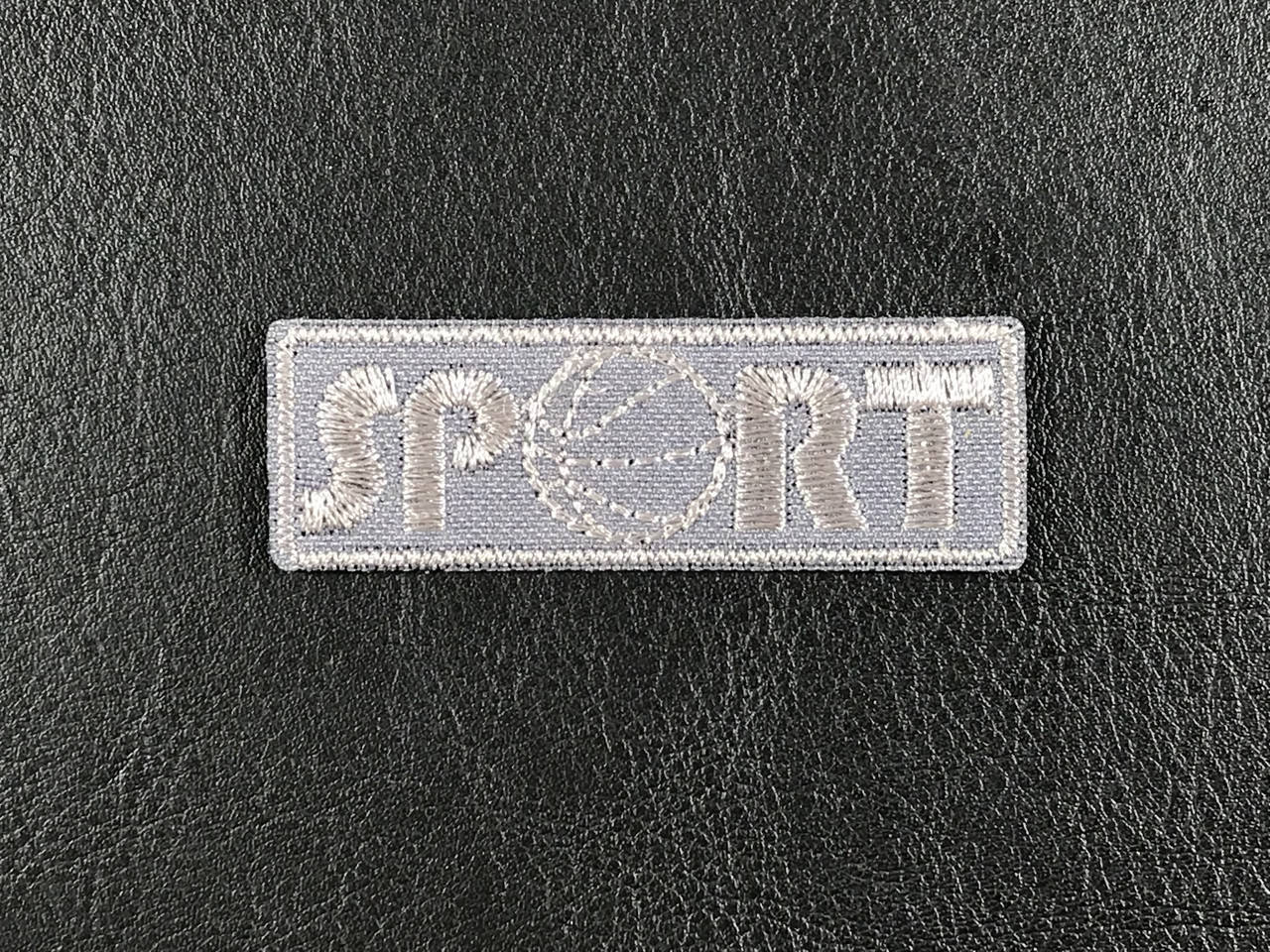 

Нашивка Sport планка с мячом цвет темно серый 60x20 мм