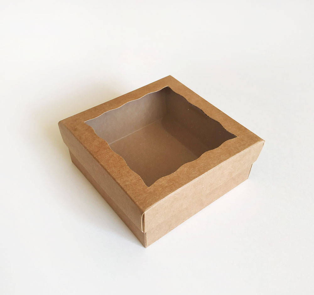 

Коробка из крафт картона с окошком 120x120x50 мм.