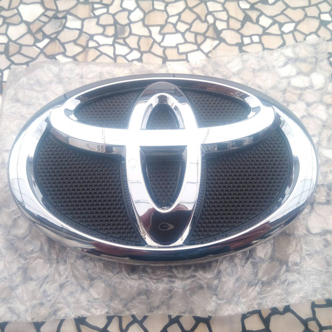 

Эмблема - значок Toyota Corolla перед 140-96 мм