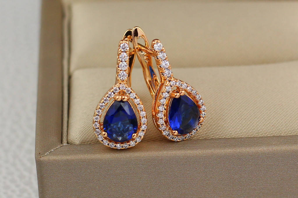 

Серьги Xuping Jewelry синяя капля в ободке из камешков 2 см золотистые