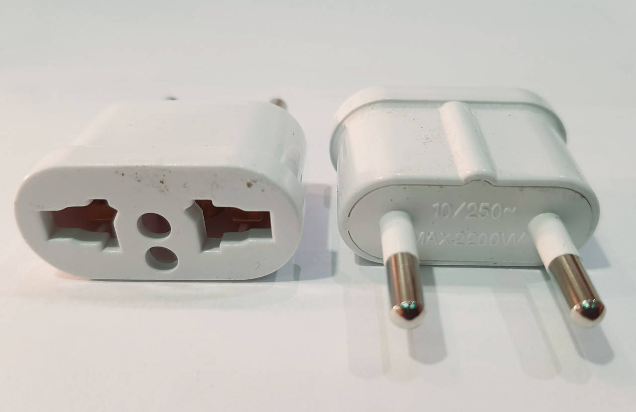 

Перехідник з американською вилки на європейську, 220V AU US UK to EU (10A-2200W)