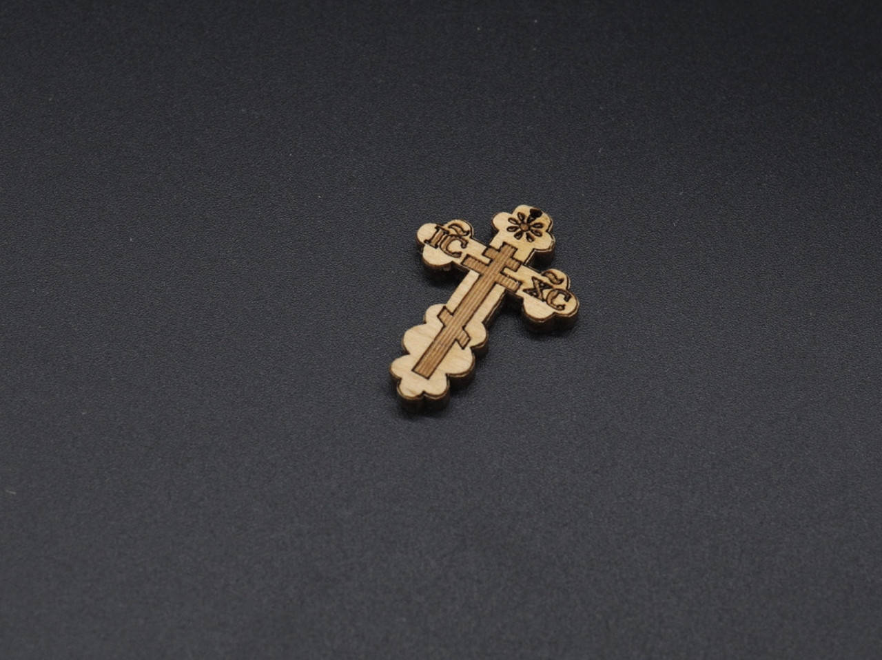 

Крестик деревянный,маленький. 34х24мм