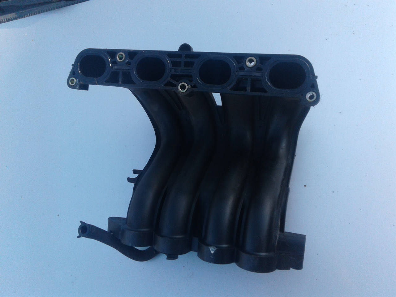 

Коллектор впускной Nissan Micra K12 2002-2010г.в. 1.2 1.4 беннзин