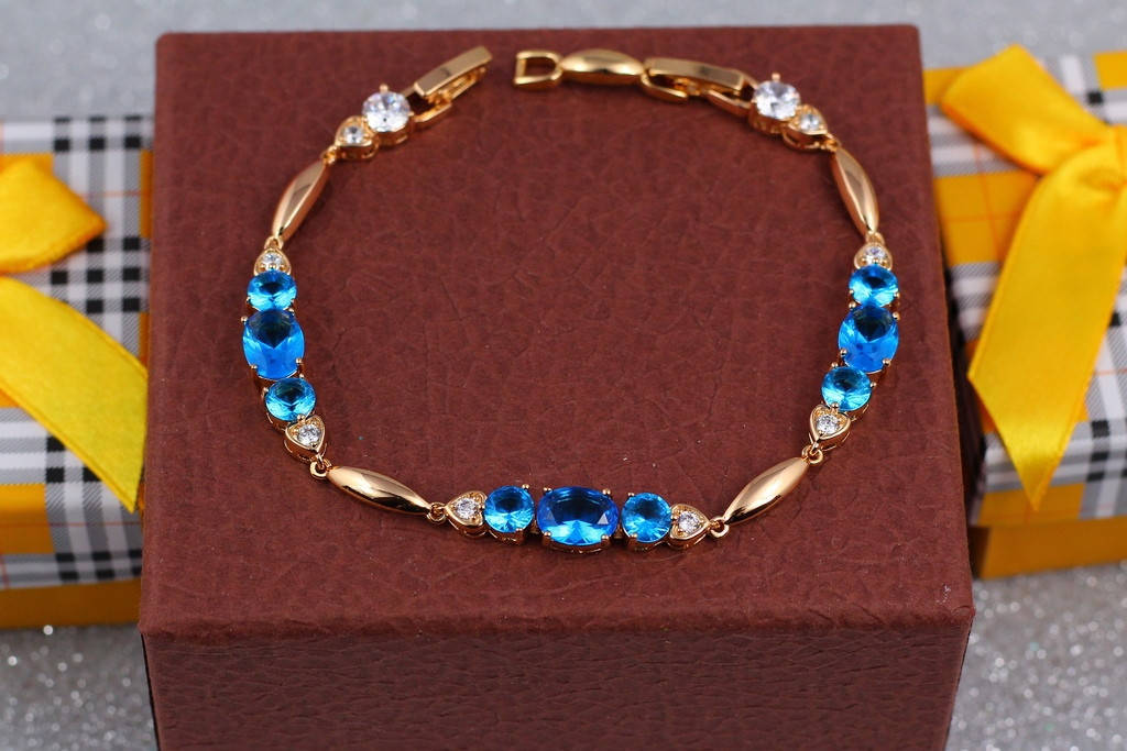 

Браслет Xuping Jewelry с крупными голубыми камнями 19 см 7 мм золотистый