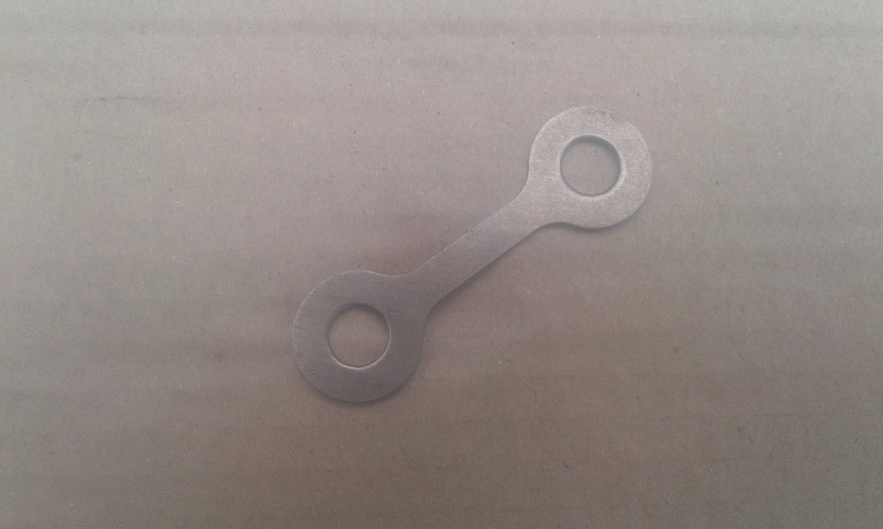 

Шайба контровочная корпуса переднего подшипника ( верхняя)