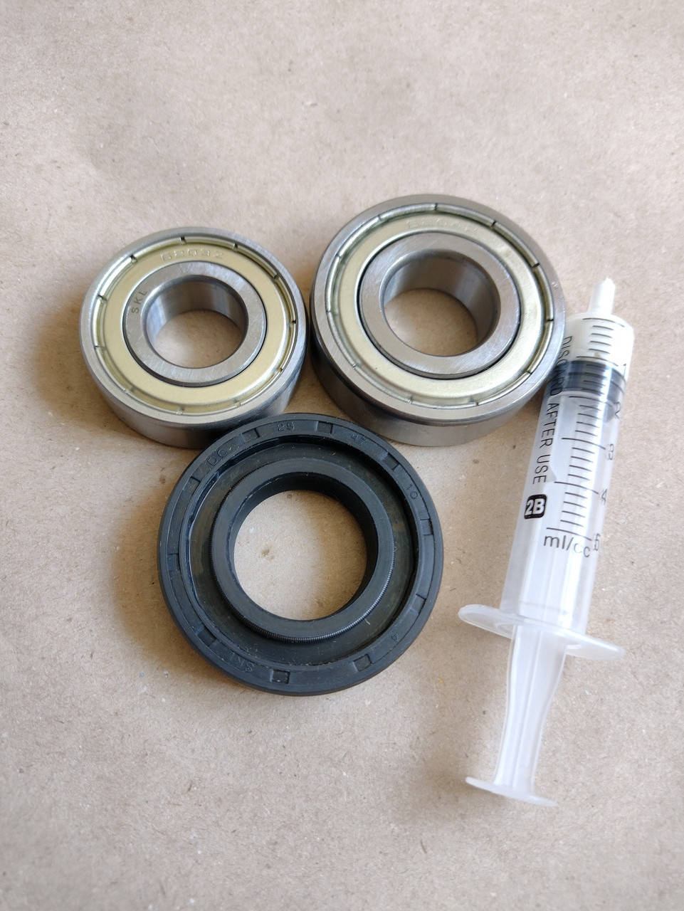 

Комплект подшипников SKL 6203+6204 + сальник (25*47*10 mm/мм) + смазка для стиральной машины gorenje, Белый