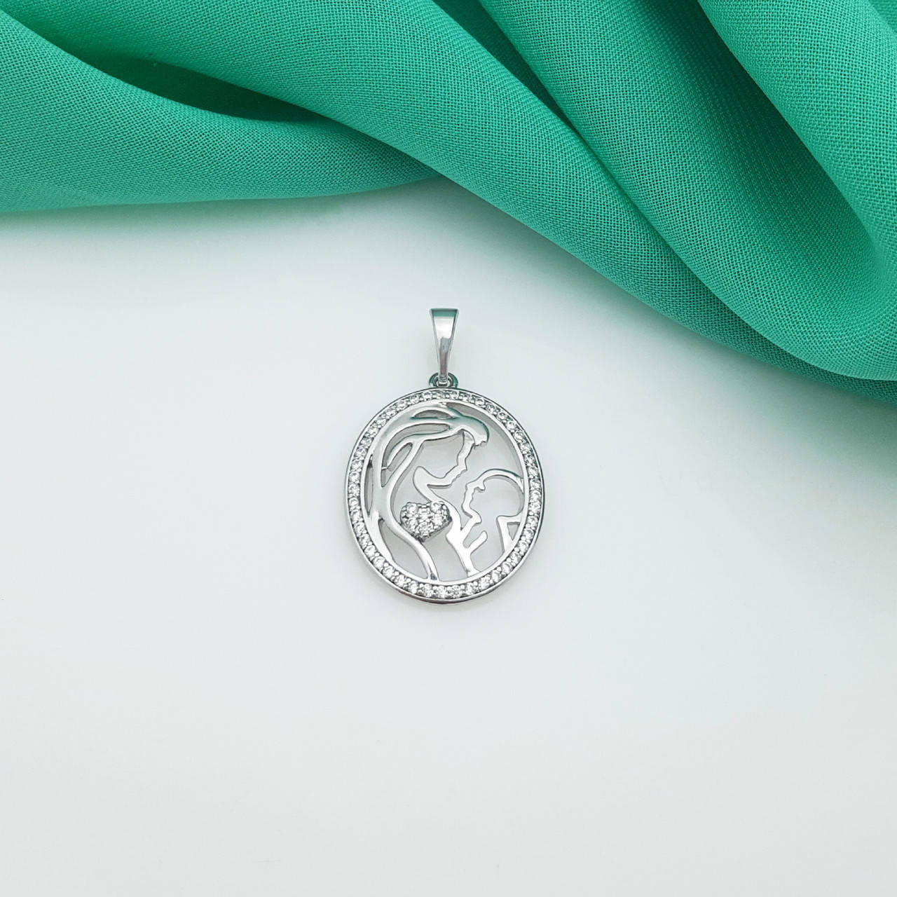 

Кулон "Мать и дитя", вставка цирконий, медсталь