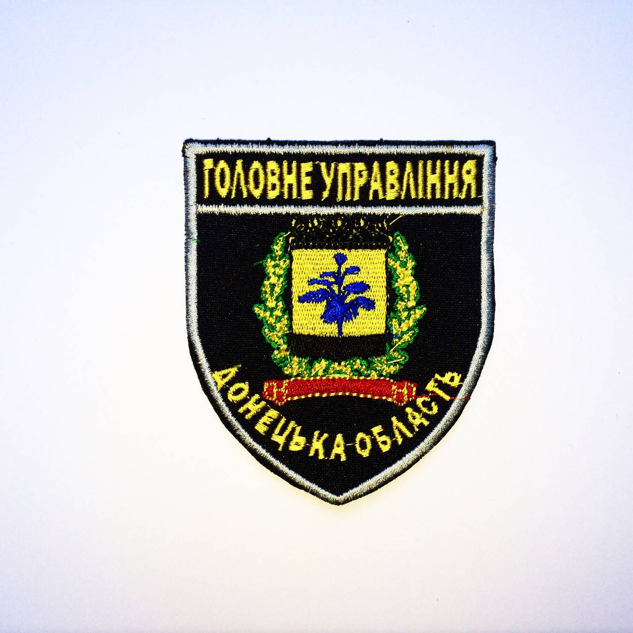 

Шеврон Поліція ГУ Донецької обл.