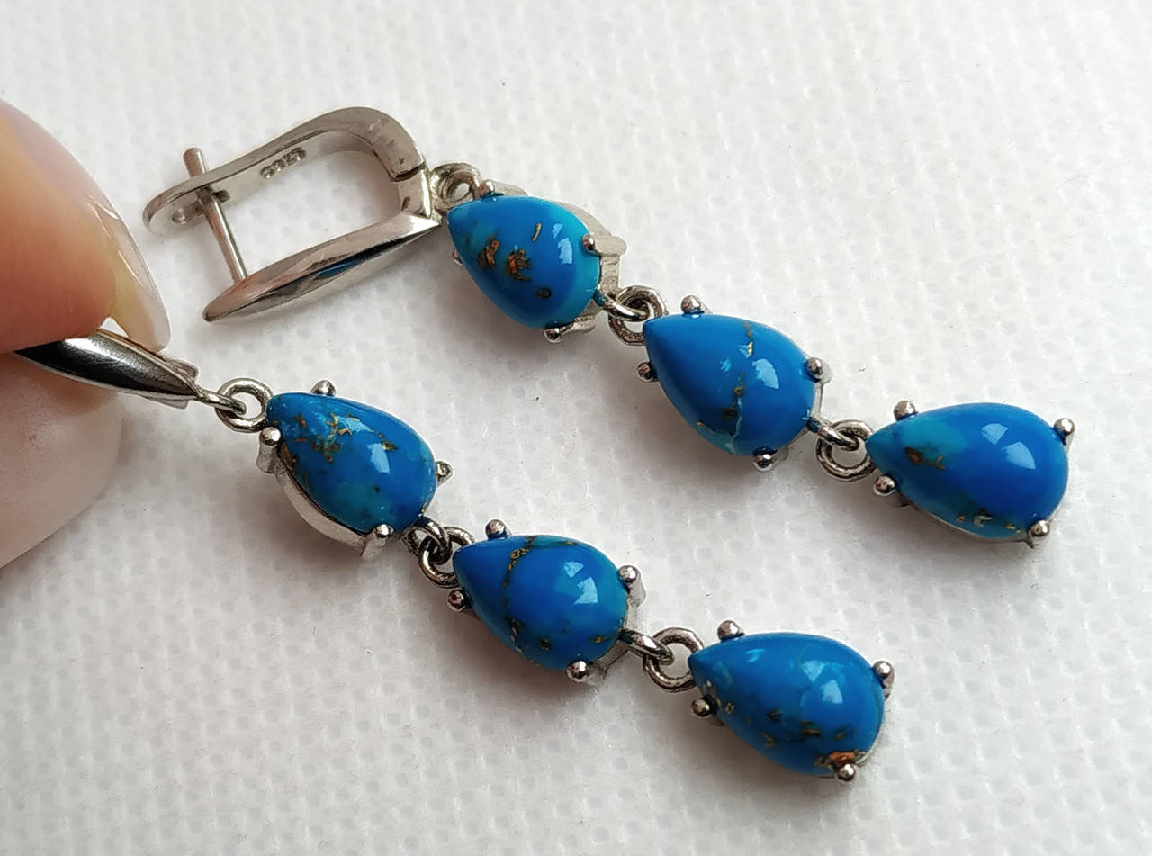 

Элегантные серьги с натуральной необлагороженной аризонской бирюзой 9х6 мм