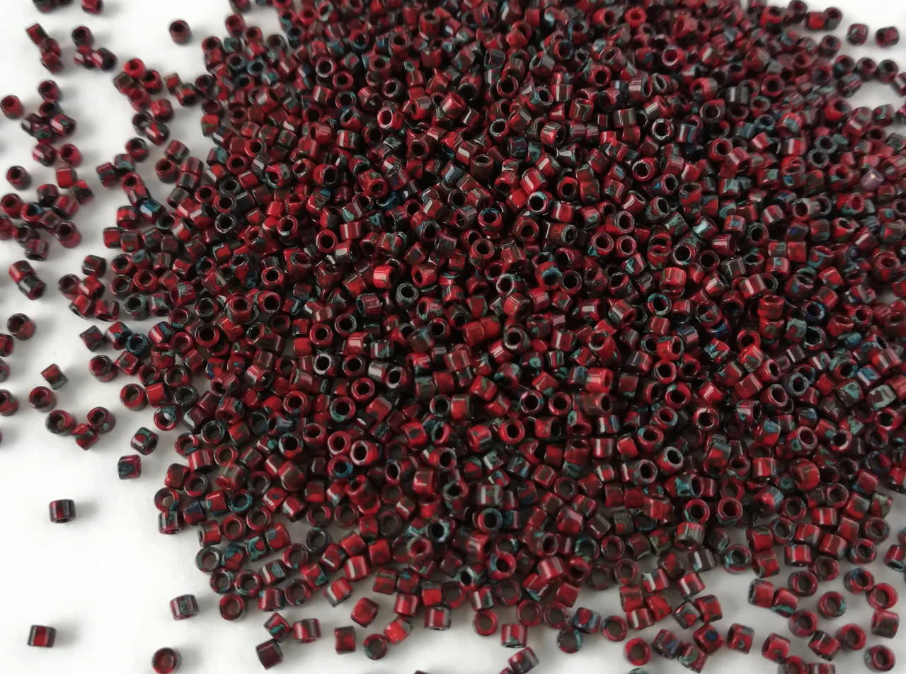 

Японський бісер Miyuki Delica 11/0 DB2263 - Opaque Red Picasso