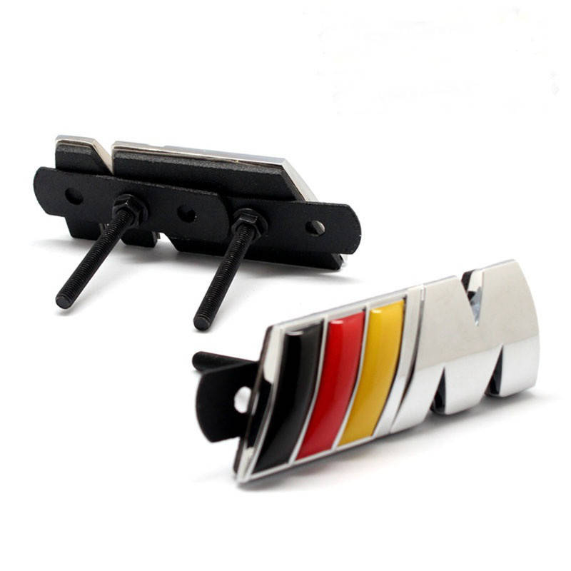 

Значок бмв M на решетку радиатора.