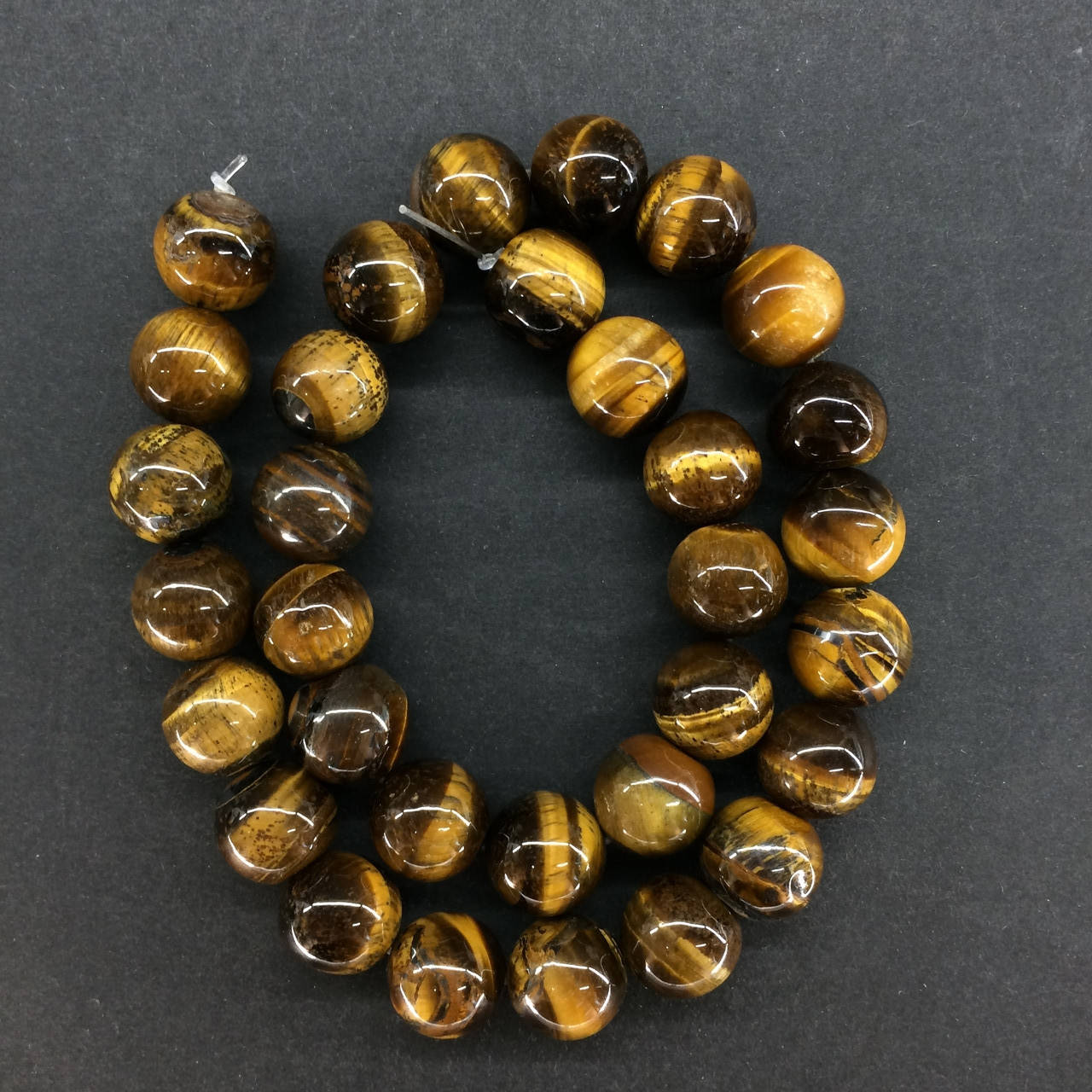 

Бусины на нитке из натурального камня Тигровый глаз гладкий шарик d=12мм