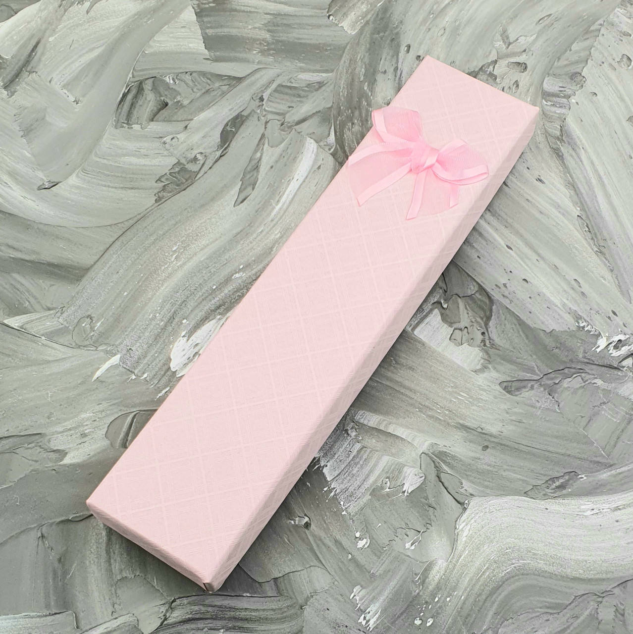 

Футляр 32276 розовый для цепочек браслетов размер 21х4 см