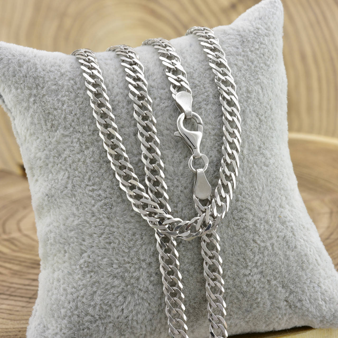 

Серебряная цепочка родированная Ромбик скруглённый ширина 5 мм длина 55