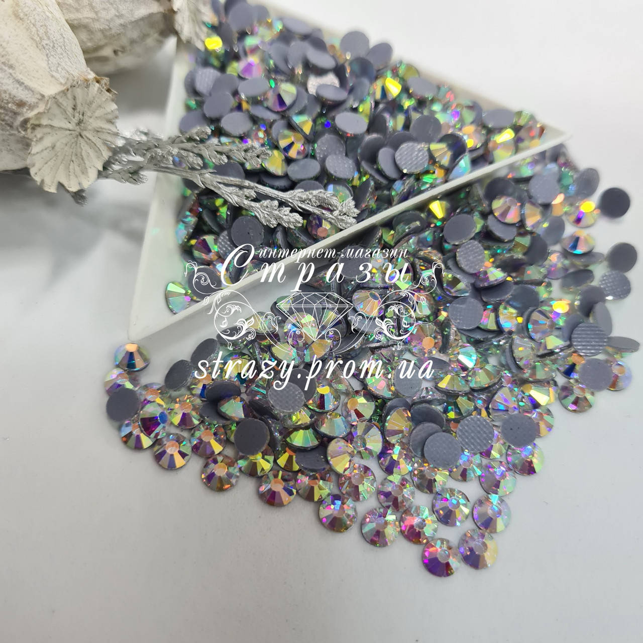 

Термо стразы Премиум ss20 Crystal AB +++ (5.0mm) 100шт (вафельный клей)