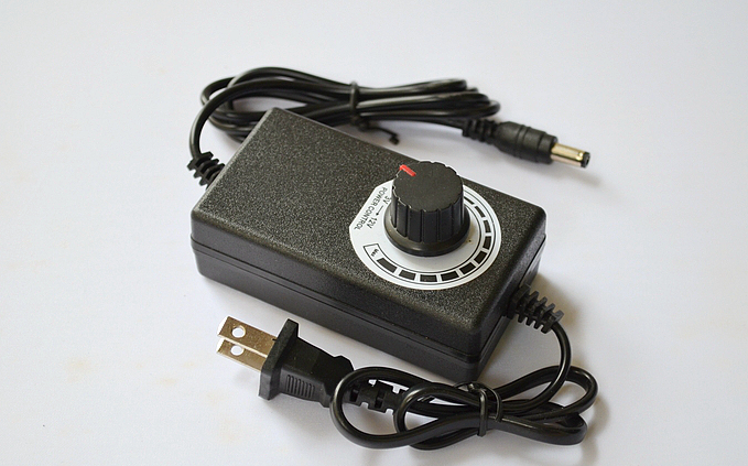 

Регулируемый Блок питания 3.0-12V 2A 24W