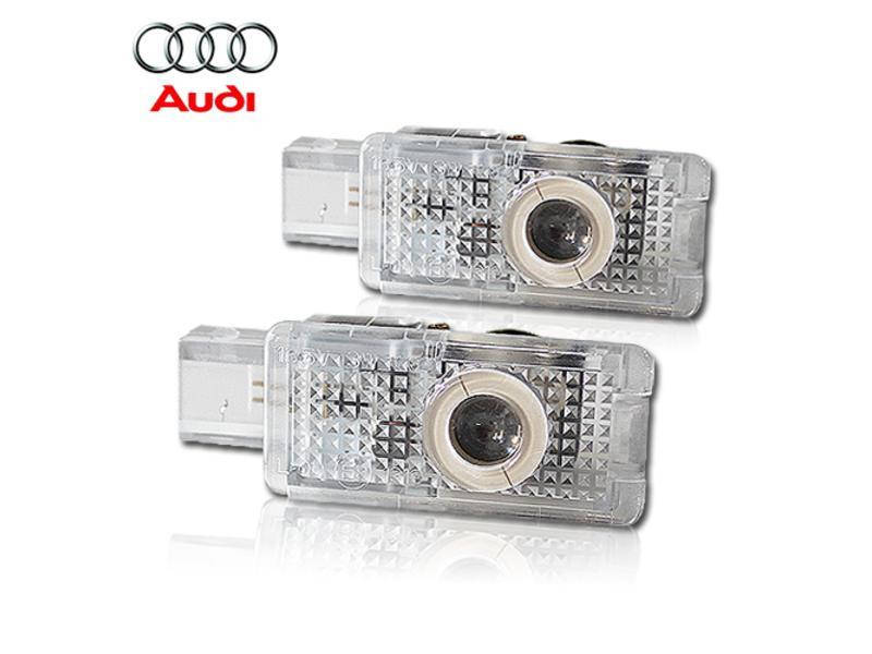 

Штатная подсветка двери с логотипом AUDI