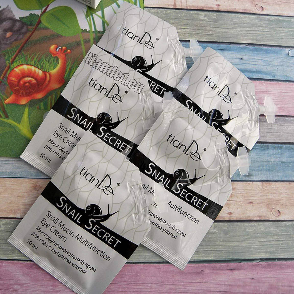 

Многофункциональный крем для глаз с муцином улитки 10 мл