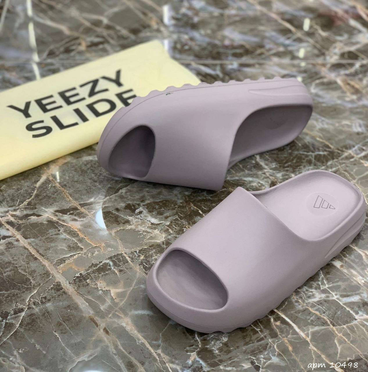 

Шлепанцы женские Adidas Yeezy Slide фиолетовые 37
