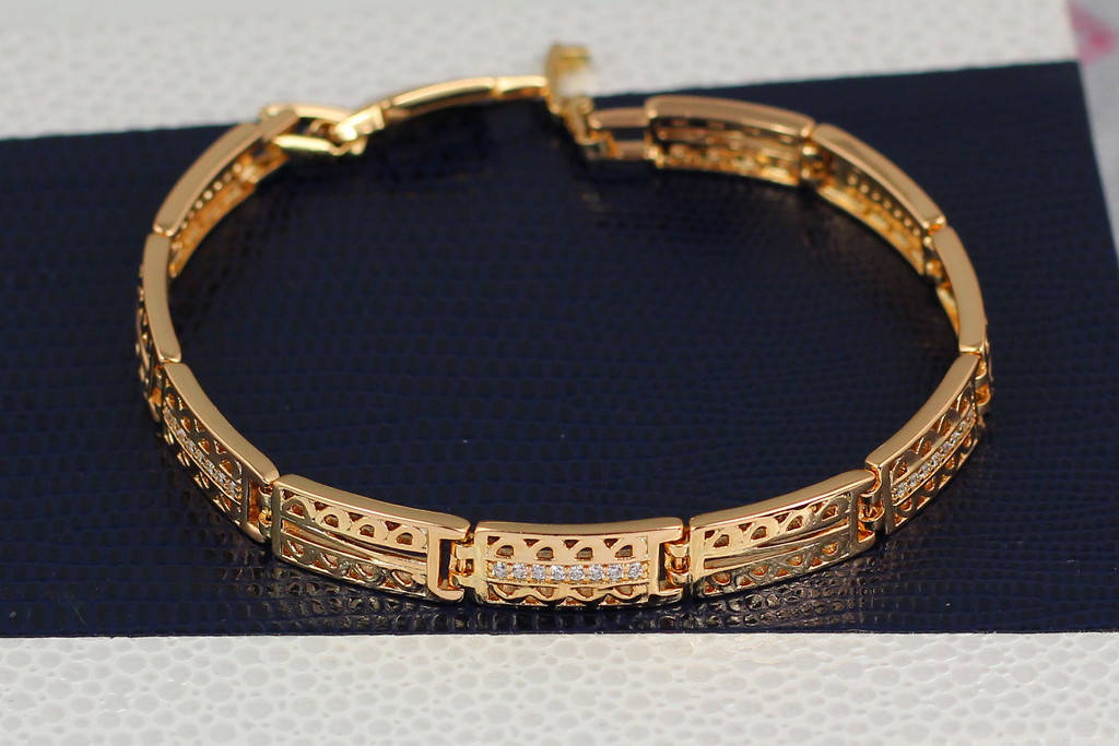

Браслет Xuping Jewelry прямоугольники с резным рисунком 17 см золотистый