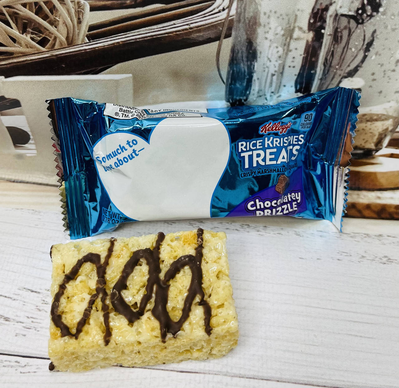 

Батончики з рисових пафсів покритих шоколадом kellogg's Rice Krispies Treats