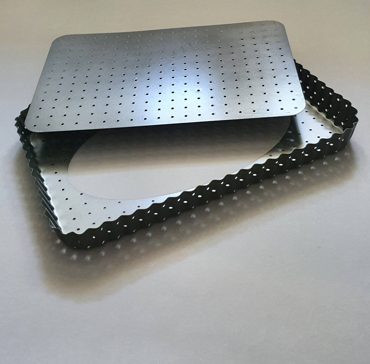 

Перфарированная форма для тарта