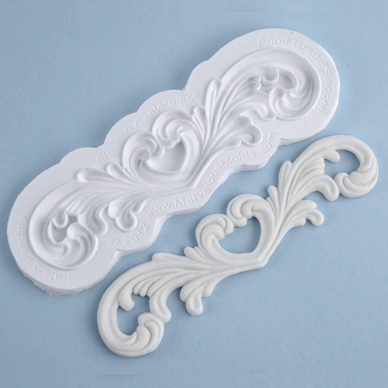 

Силиконовый молд Завиток-сердце 18.0х5.8 см