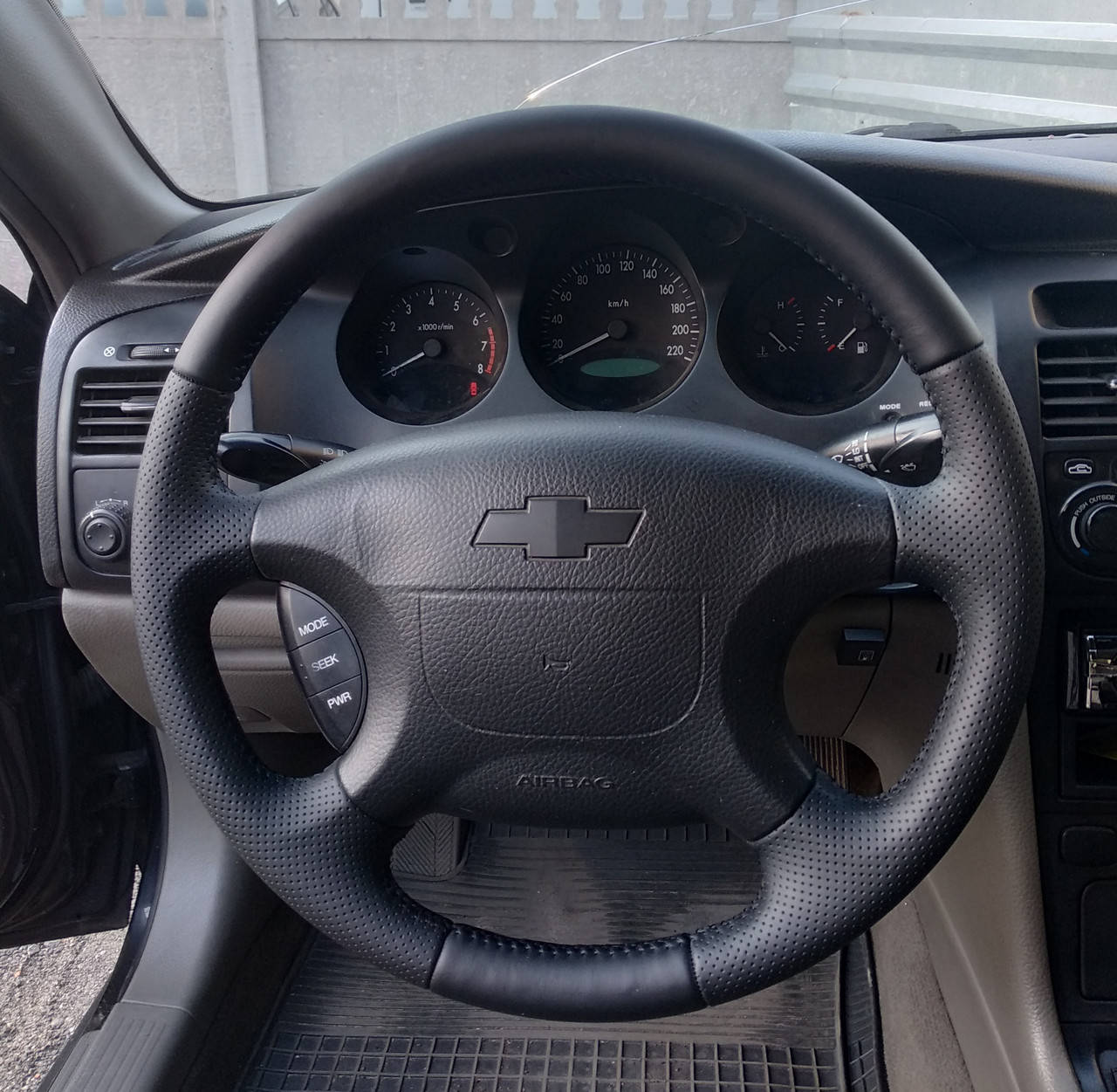 

Чехол - оплетка из натуральной кожи на руль Chevrolet Evanda, Черный