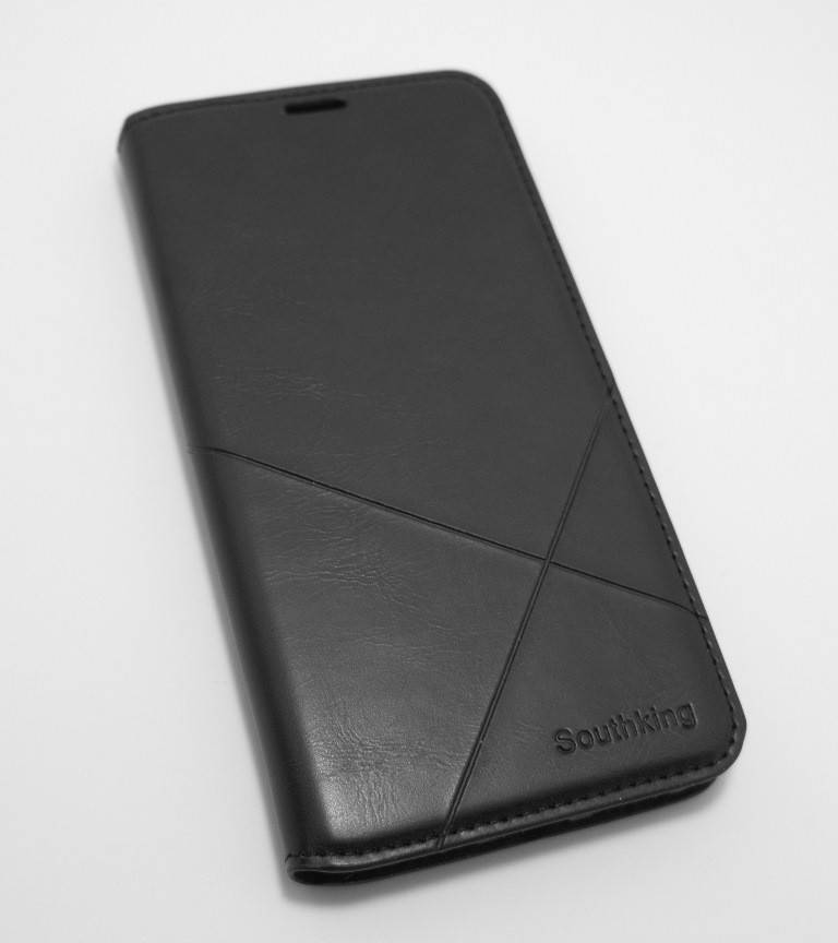 

Чехол-книжка для смартфона Xiaomi Redmi 8 чёрная MKA, Черный
