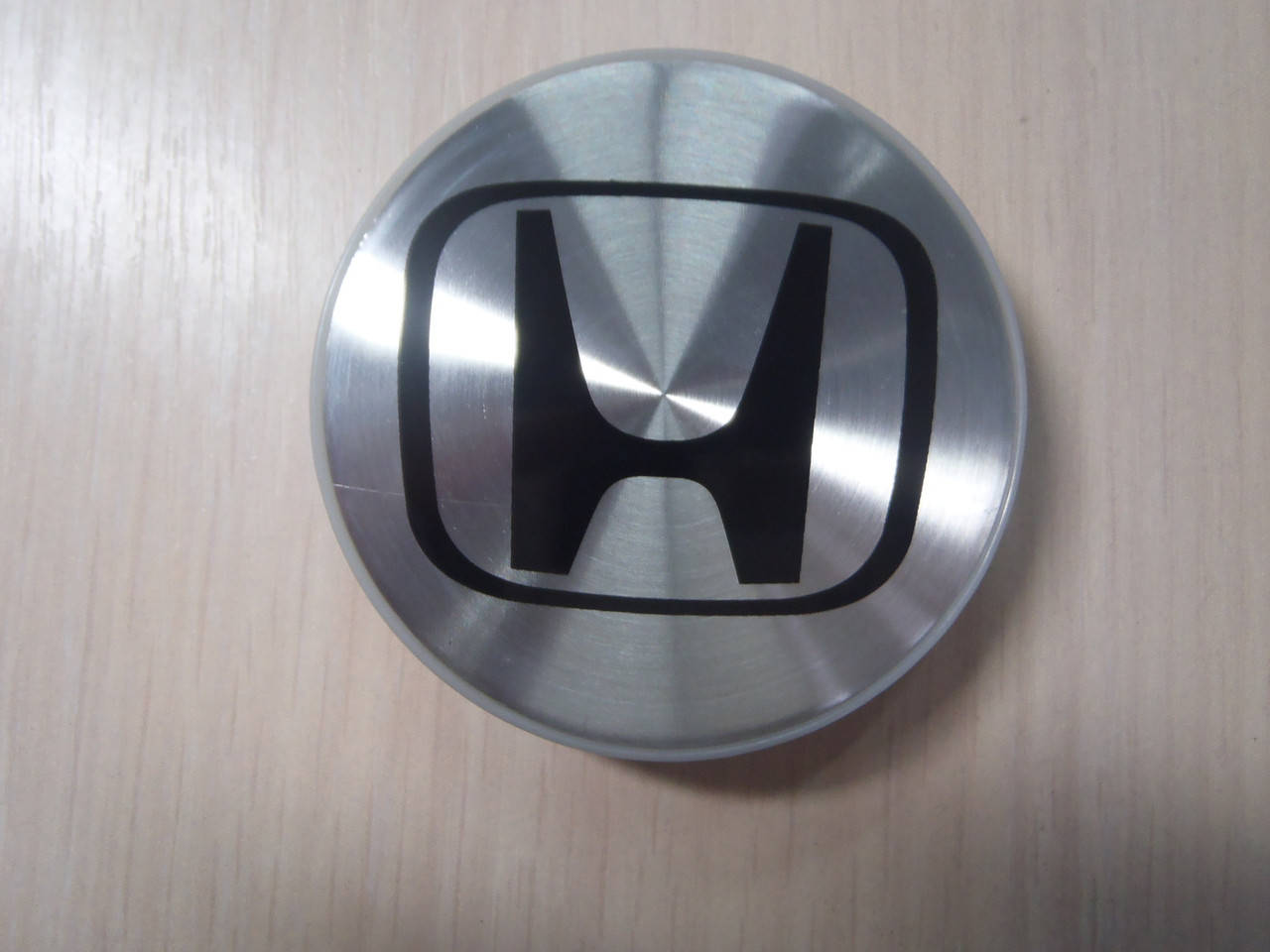 

Колпачки заглушки в литые диски Honda/Хонда 69/64/12 мм.