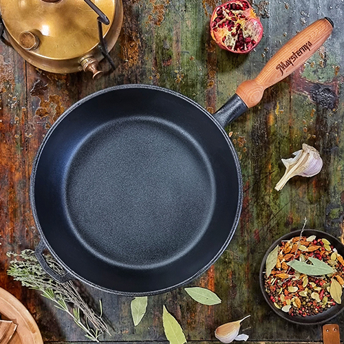 

Сковорода чавунна лита 26*6см з дерев'яною ручкою