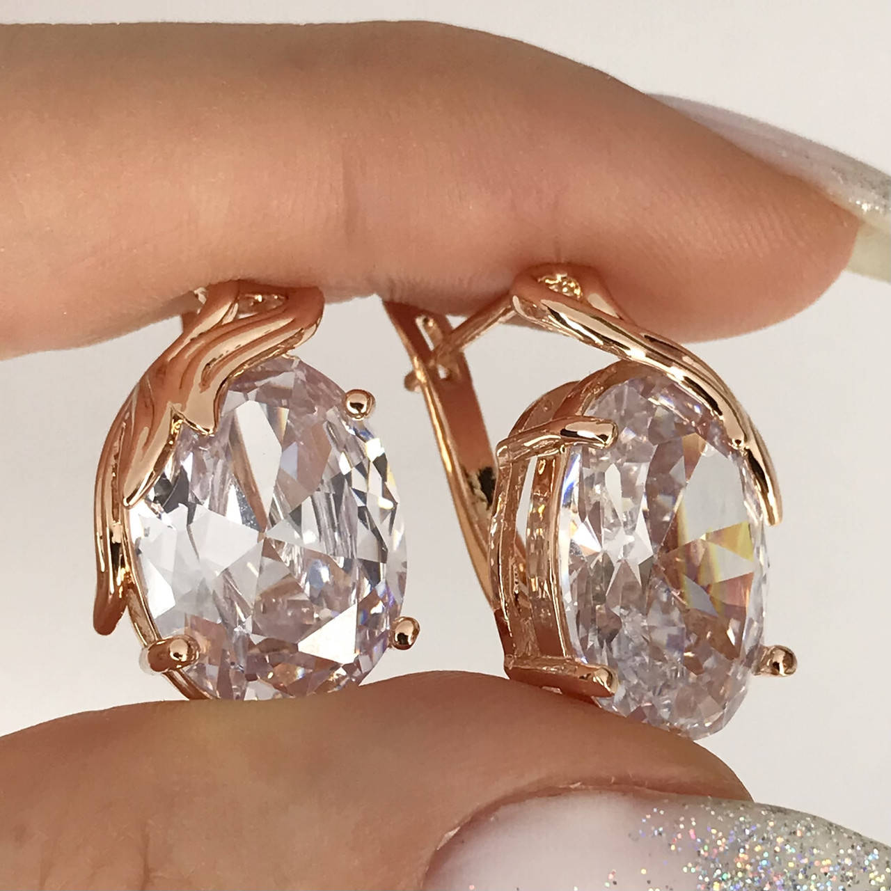 

Серьги с большими овальными белыми цирконами позолота 18к.