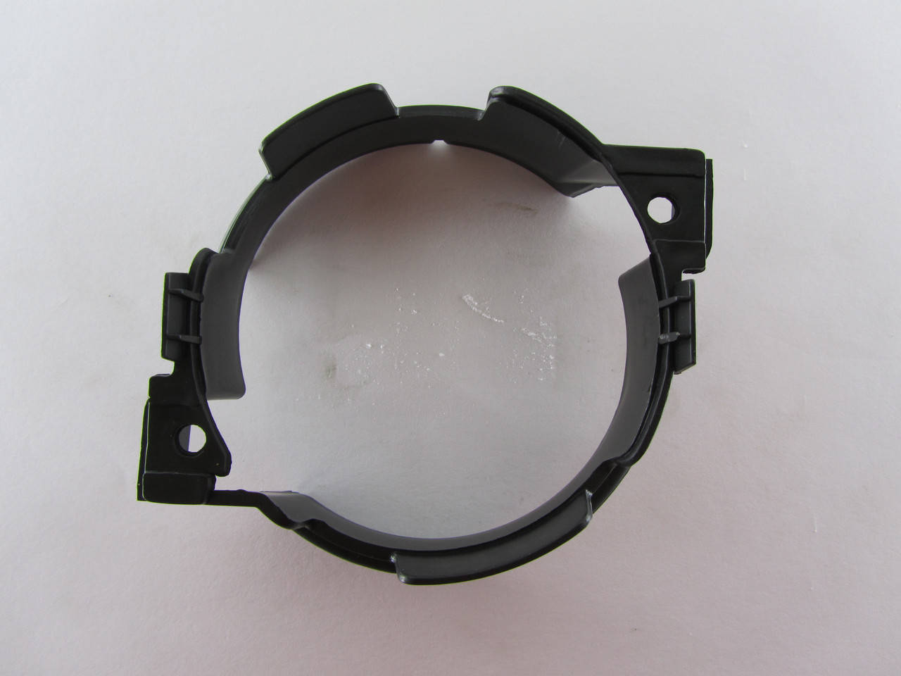 

Крепление противотуманки левой Dacia Logan ( -2009г.), Черный