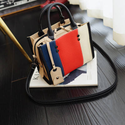 

Женская сумочка трёхцветная