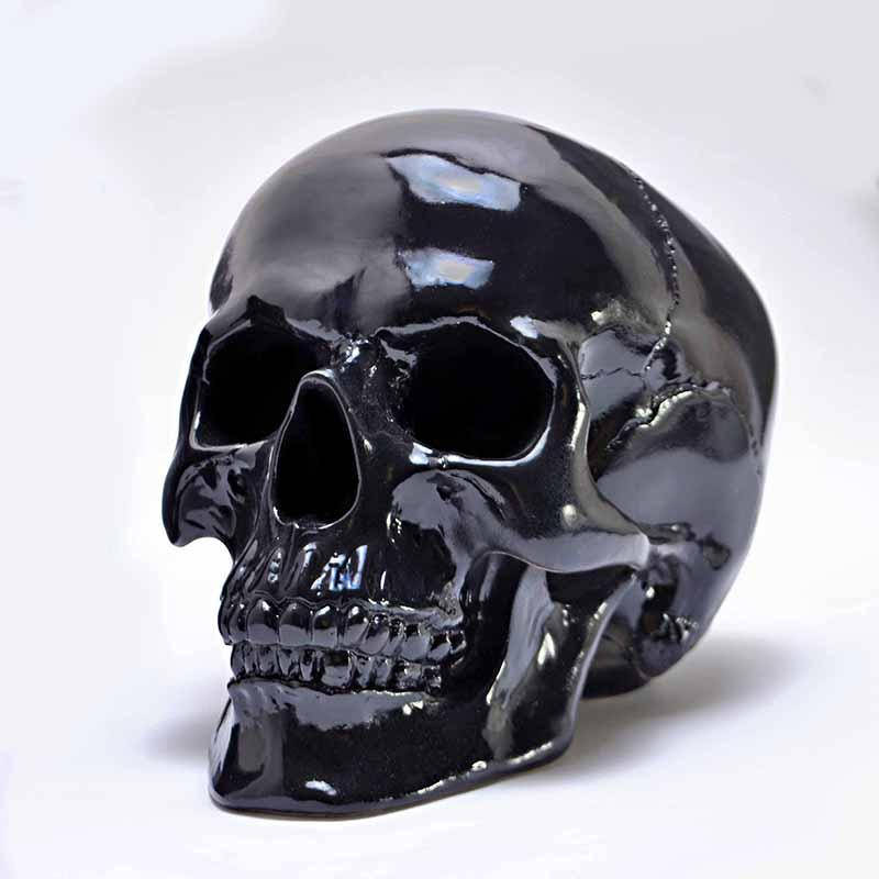 

Череп человека декоративный черный в натуральную величину глянцевый