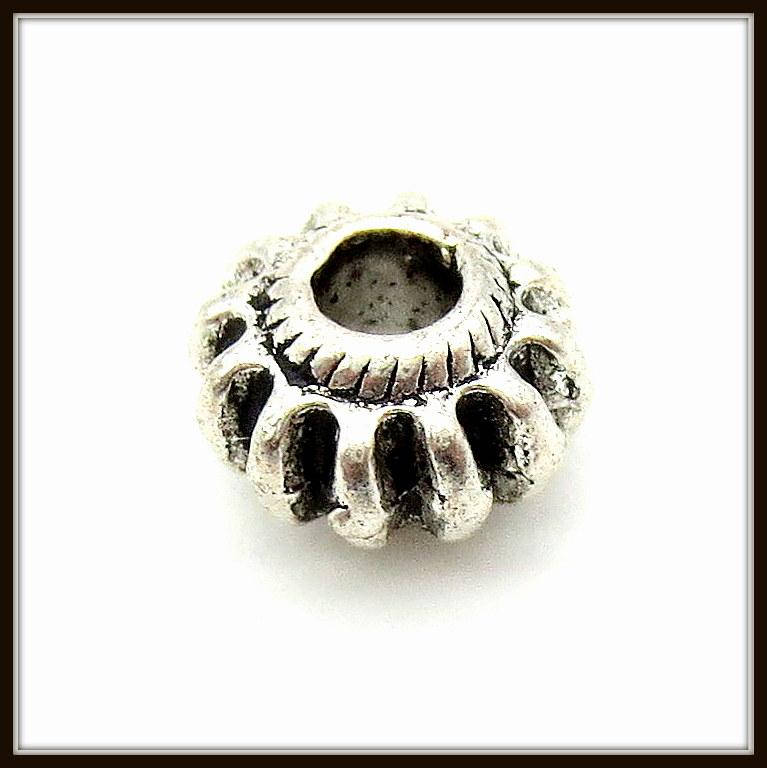 

Металл. бусина "бочонок" серебро (d 0,7 х h 0,4 см) 35 шт в уп.