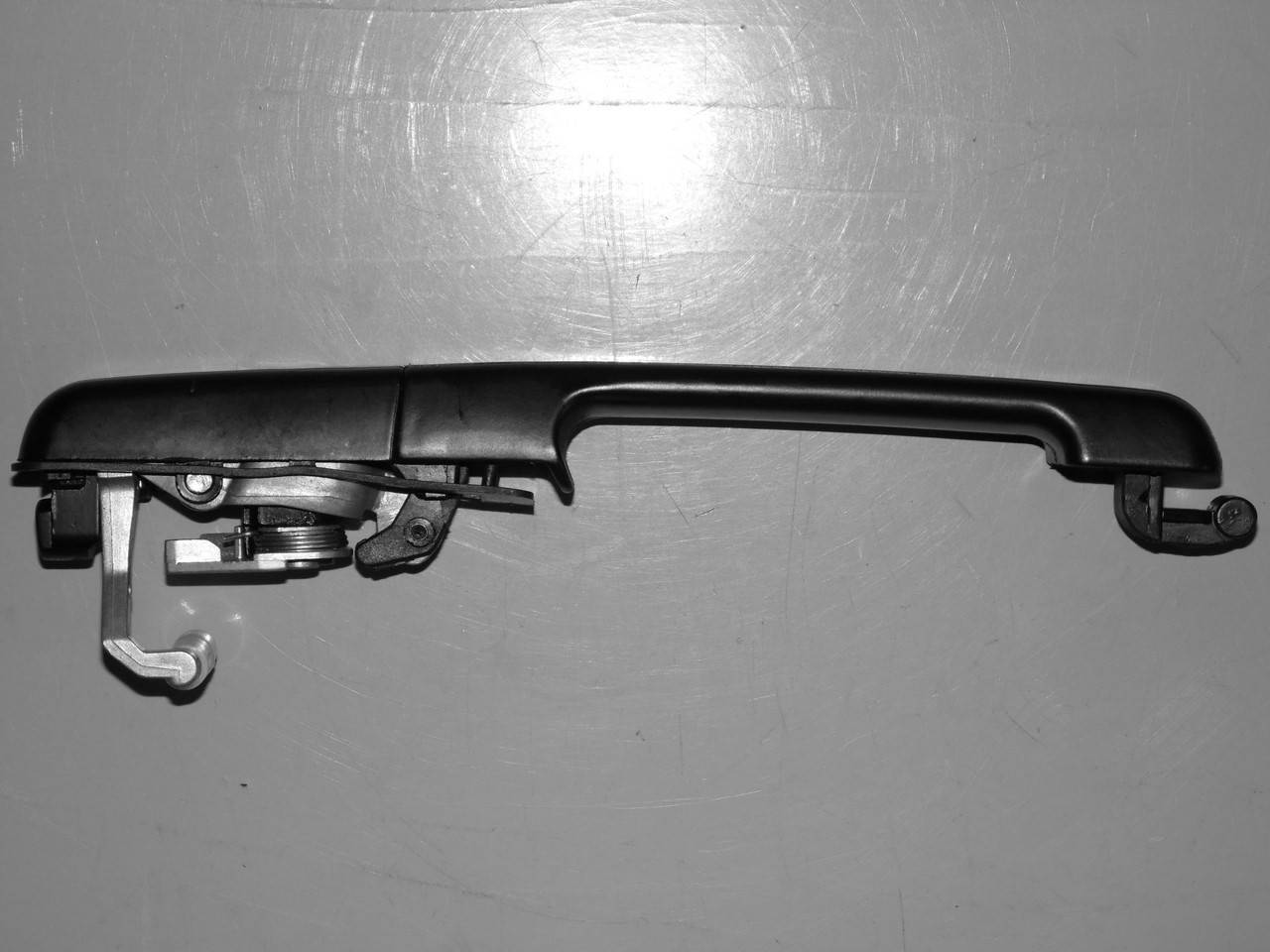 

Ручка двери передняя левая VW passat b3 Seat toledo на Фольцваген Пассат б3 для Толедо 1187100870