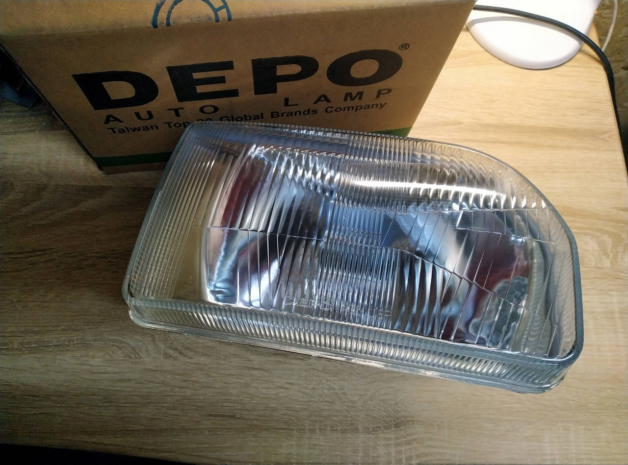 

Фара правая механическая DEPO 431-1118R-LD-E FORD ESCORT 86-90