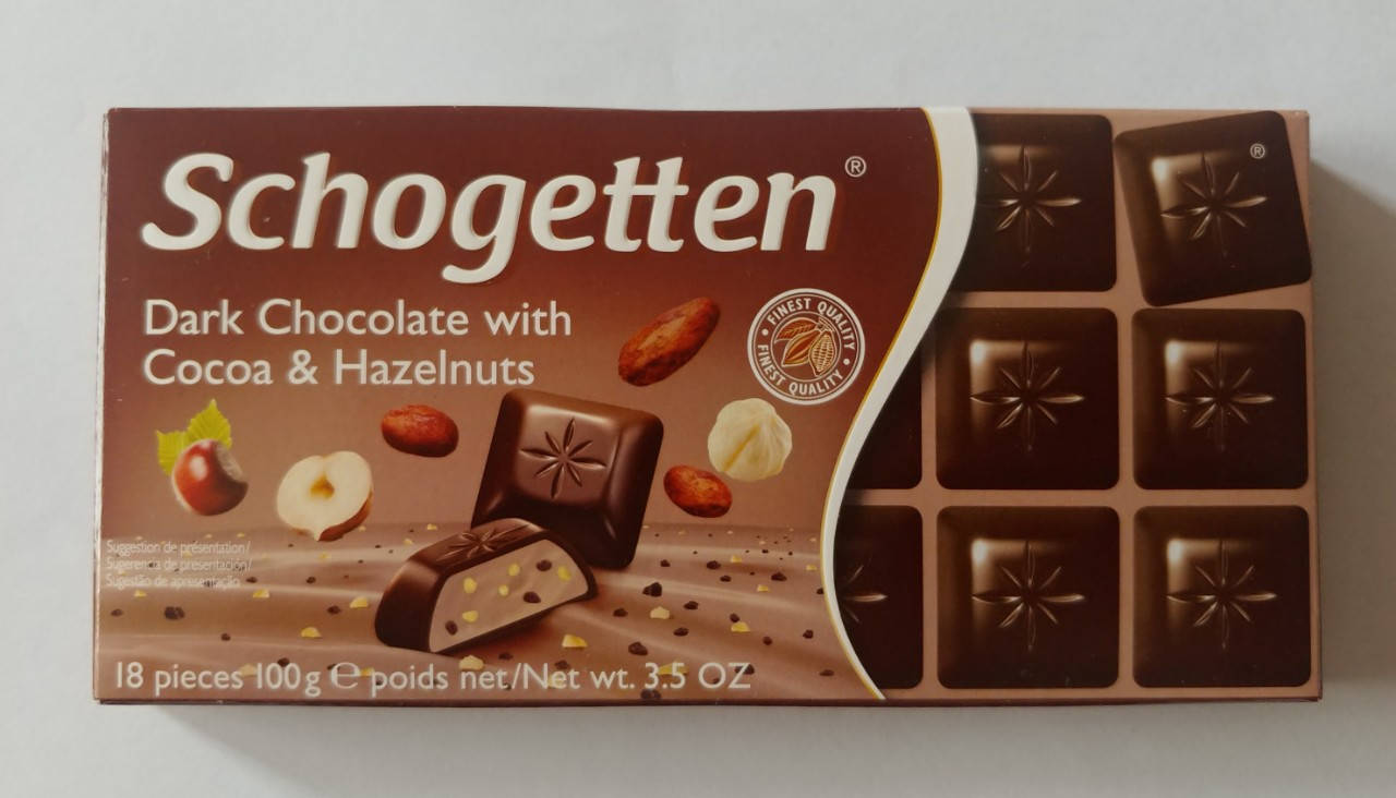 

Schogetten Темный шоколад с какао начинкой и дробленым лесным орехом 100 гр