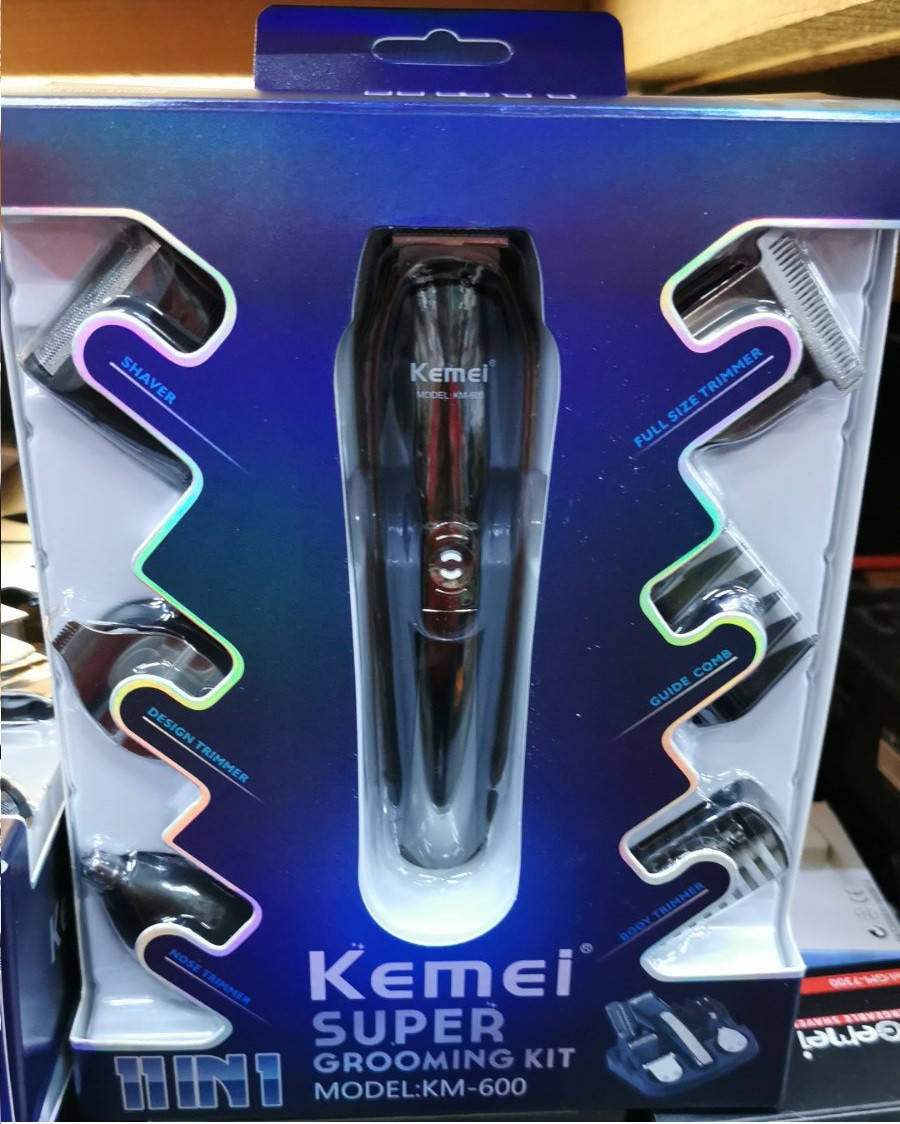 

Машинка для стрижки Kemei KM-600 11 in 1 с подставкой