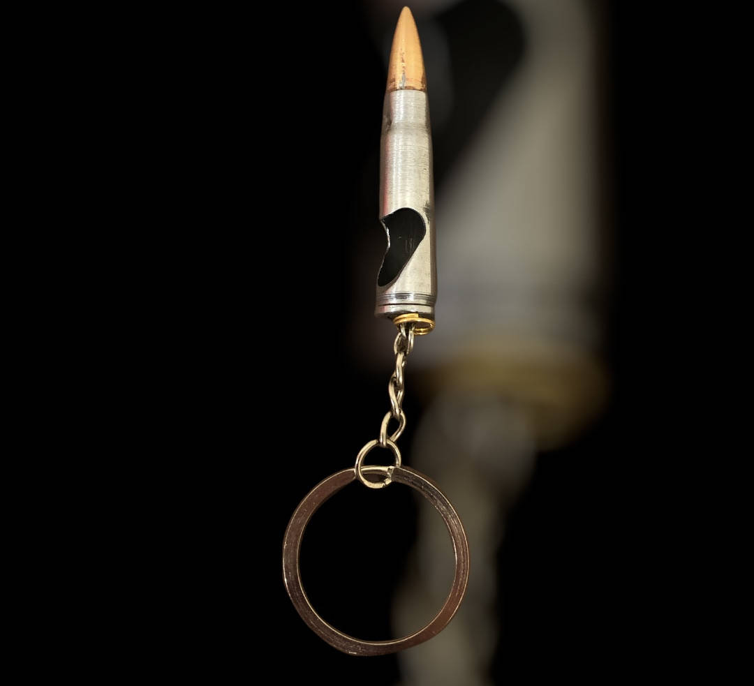 

Брелок - открывашка из патрона